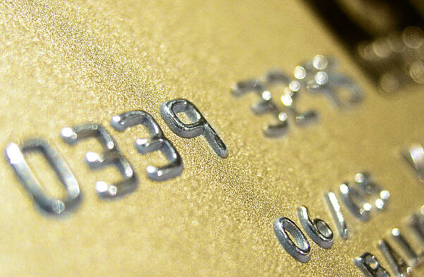 Gold credit card with tipping decoration by LEONHARD KURZ