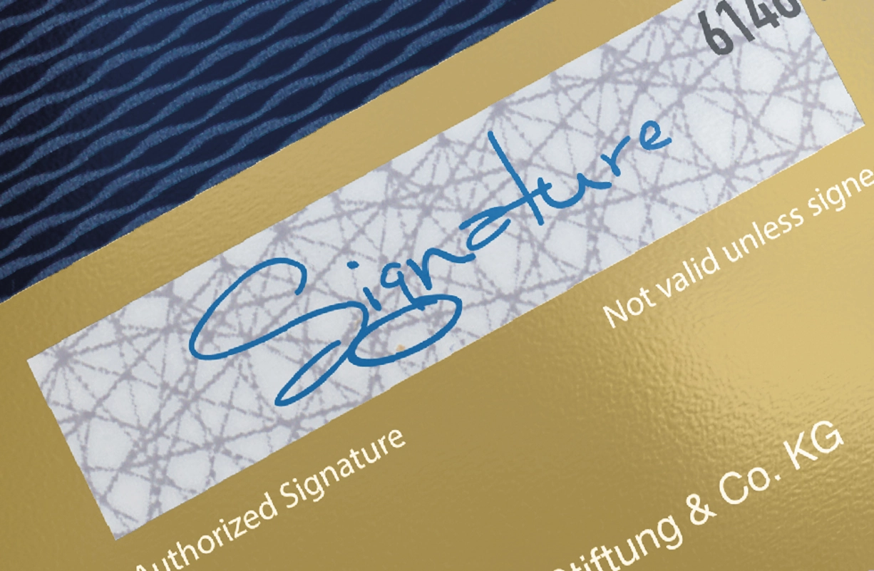 We Are Your Top Choice for Innovative Payment Security & Card Technology Gold credit card with signature panel by LEONHARD KURZ