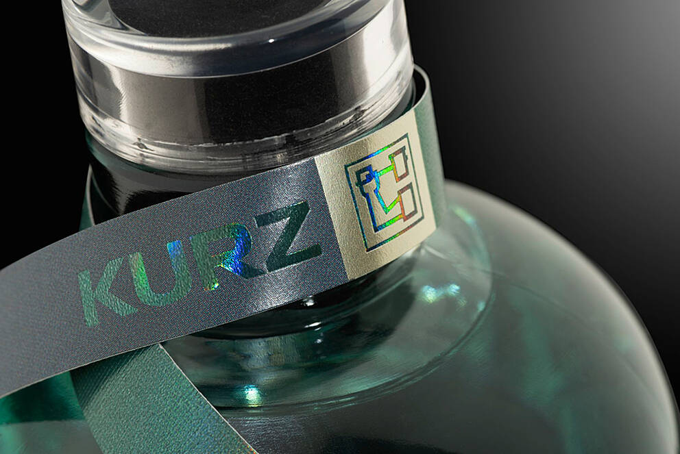 Hologram effect on bottle label with KURZ logo