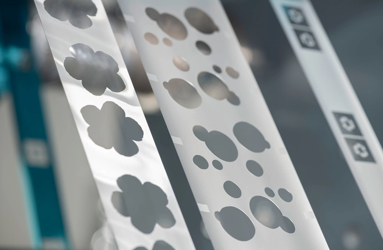 Precise & Environmentally Friendly Labeling Solutions by LEONHARD KURZ Cold transfer foil with flower & round cut-outs