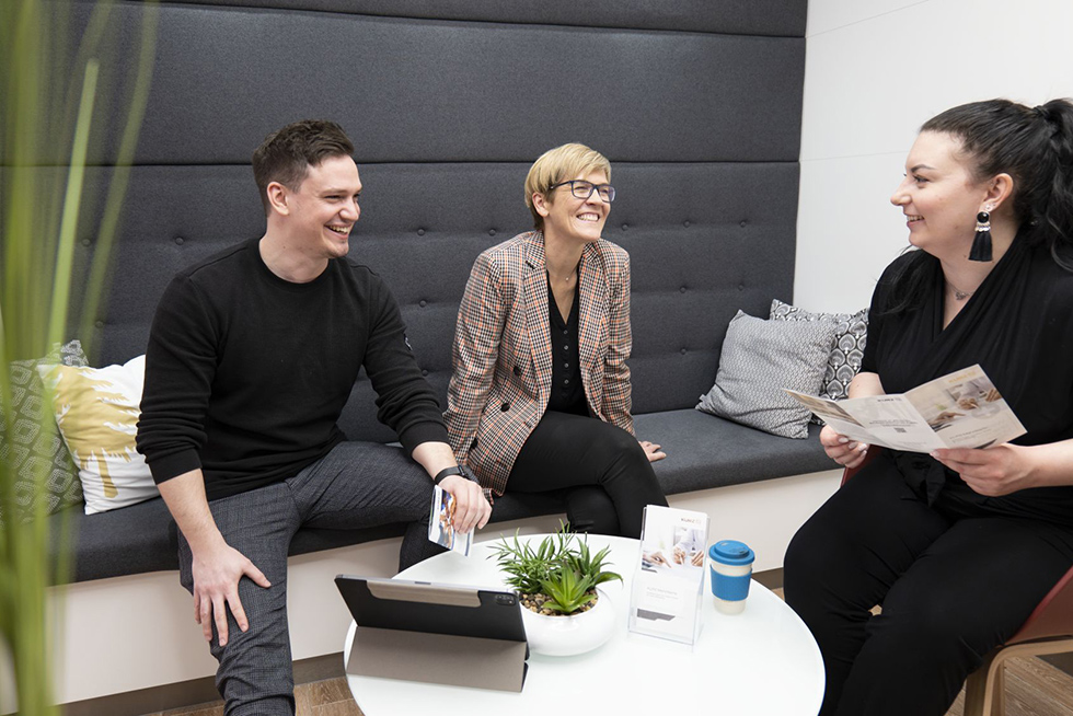 Group of KURZ employees in conversation